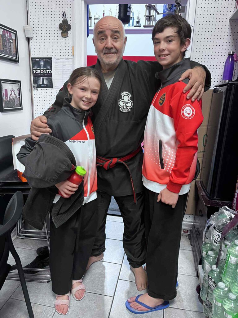 Professor John Lianos with students from Embrun Family Karate Club